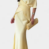 Veleda Two-Piece Ensemble with Crisscross Straps and Flowing Skirt