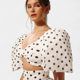 Sherine Polka Dot Ensemble: Puff Sleeve Top with Front Slit Skirt