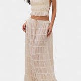Eugenie Halter Neck Pleated Ensemble with Flowing High-Waisted Skirt
