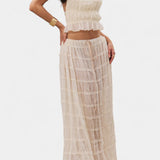 Eugenie Halter Neck Pleated Ensemble with Flowing High-Waisted Skirt