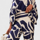 Artistic Print Off-the-Shoulder Top and Wide-Leg Pants Set by Sybella