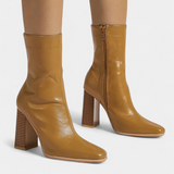 Linde Contemporary Mid-Calf Boots with a Spacious Fit